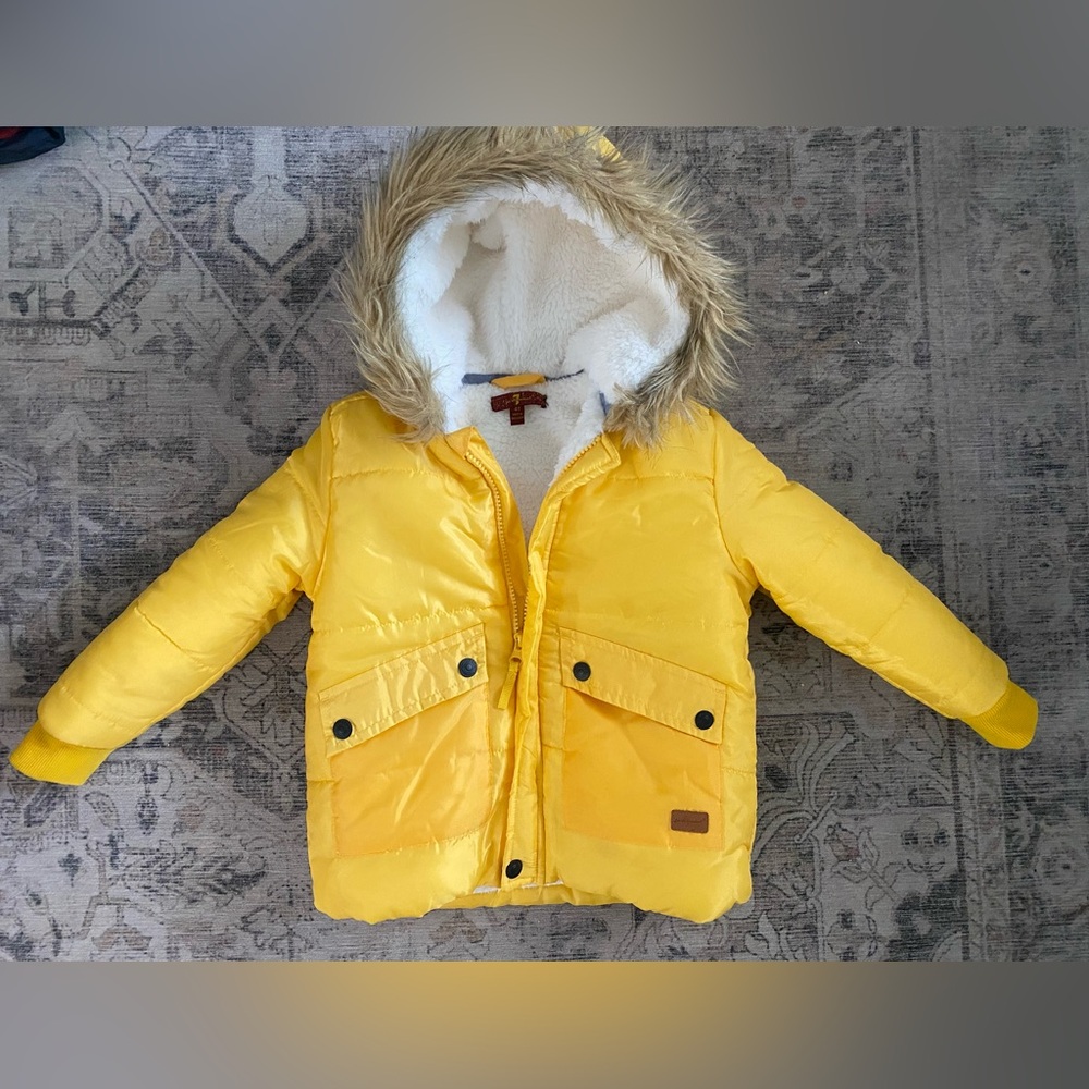 Kids yellow jacket- Brand: 7 for all mankind Size 4T Fleece interior.